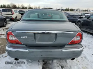 2006 Jaguar XJ with VIN SAJWA79B06SH07721, listed as a Copart auction lot 87851345 with 93,004 mi miles and Salvage Title. Bid and sale history available at carsss.com. Image 6.