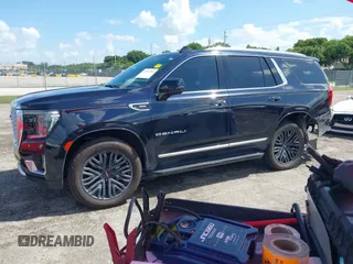 2021 GMC Yukon Denali with VIN 1GKS2DKL7MR471280, listed as a IAAI auction lot 40189766 with 126,591 mi miles. Bid and sale history available at carsss.com. Image 2.