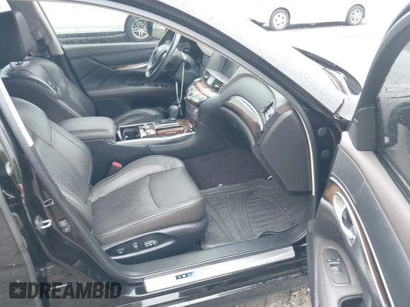 2012 Infiniti M with VIN JN1BY1AP8CM334036, listed as a IAAI auction lot 42354293 with 110,384 mi miles and . Bid and sale history available at DreamBid. Image 5.