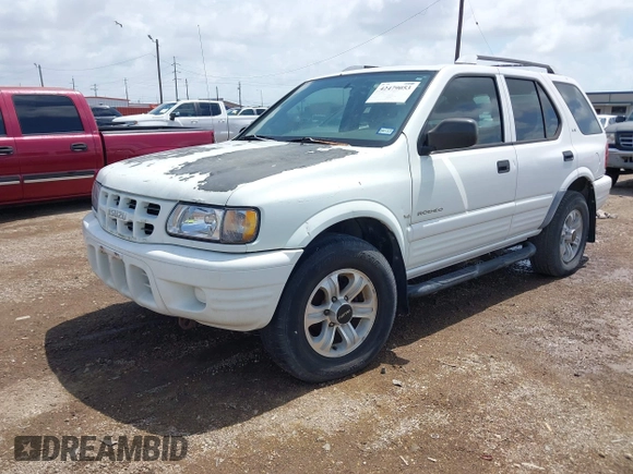 2001 Isuzu Rodeo S with VIN 4S2CK58W414357404, listed as a IAAI auction lot 42479053 with Not provided miles and . Bid and sale history available at DreamBid. Image 2.