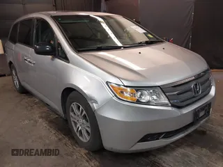 2012 Honda Odyssey EX-L with VIN 5FNRL5H63CB006577, listed as a IAAI auction lot 42040297 with 234,891 mi miles and . Bid and sale history available at DreamBid. Image 1.