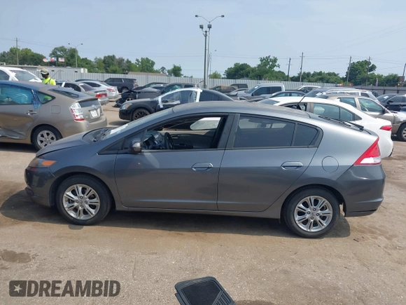 2010 Honda Insight EX with VIN JHMZE2H71AS043465, listed as a IAAI auction lot 42312556 with 151,009 mi miles and . Bid and sale history available at DreamBid. Image 14.