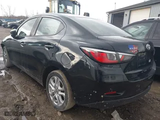 2017 Toyota Yaris iA with VIN 3MYDLBYV6HY190569, listed as a IAAI auction lot 41497732 with 138,221 mi miles. Bid and sale history available at carsss.com. Image 3.