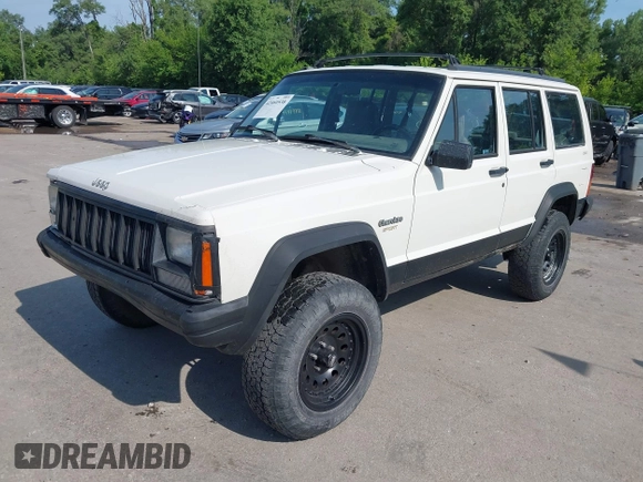 1996 Jeep Cherokee Sport z VIN 1J4FJ68S3TL226188, wystawiony jako IAAI lot #42460538 z przebiegiem 217 118 mil mil oraz . Historia ofert i sprzedaży dostępna na DreamBid. Obrazek 17.