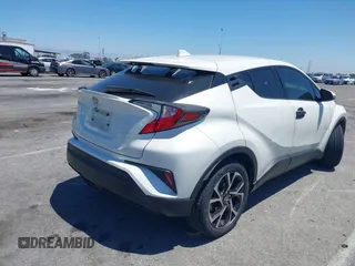 2019 Toyota C-HR XLE z VIN JTNKHMBX2K1049065, wystawiony jako IAAI lot #42226727 z przebiegiem 63 818 mil mil oraz . Historia ofert i sprzedaży dostępna na DreamBid. Obrazek 4.
