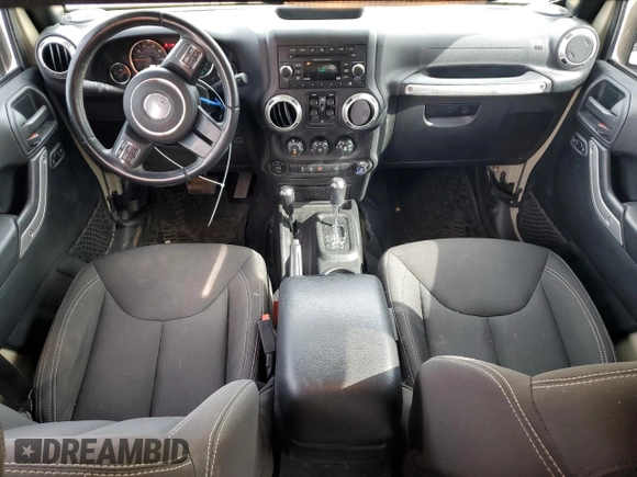 2018 Jeep Wrangler JK Unlimited Altitude with VIN 1C4BJWEG3JL813654, listed as a Copart auction lot 48989875 with 56,695 mi miles and Salvage Title. Bid and sale history available at carsss.com. Image 8.