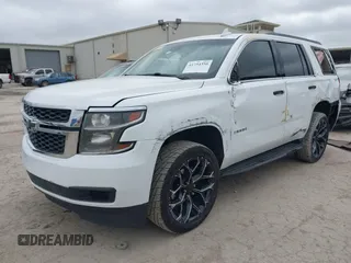 2015 Chevrolet Tahoe LT with VIN 1GNSCBKC4FR530776, listed as a IAAI auction lot 41754350 with 174,694 mi miles and . Bid and sale history available at DreamBid. Image 2.