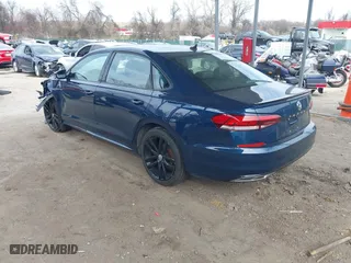 2021 Volkswagen Passat 2.0T R-Line with VIN 1VWMA7A35MC018415, listed as a IAAI auction lot 41908608 with 61,669 mi miles. Bid and sale history available at carsss.com. Image 3.
