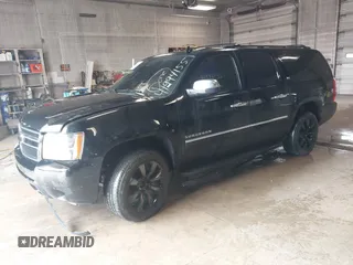2010 Chevrolet Suburban LTZ with VIN 1GNUKKE39AR106851, listed as a IAAI auction lot 41994155 with 148,776 mi miles. Bid and sale history available at carsss.com. Image 17.