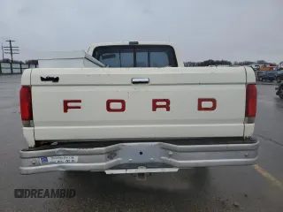 1990 Ford F-150 with VIN 1FTDF15Y6LPA89296, listed as a Copart auction lot 45693695 with 132,908 mi miles and Salvage Title. Bid and sale history available at carsss.com. Image 6.