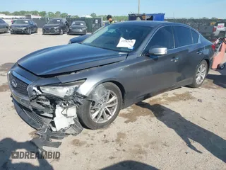2014 Infiniti Q50 Hybrid Premium with VIN JN1AV7AP4EM691014, listed as a IAAI auction lot 41984130 with 114,230 mi miles and . Bid and sale history available at DreamBid. Image 17.