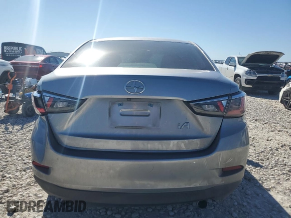 2016 Scion iA z VIN 3MYDLBZV4GY144476, wystawiony jako Copart lot #47667595 z przebiegiem 55 060 mil mil oraz Szkoda całkowita • Salvage title. Historia ofert i sprzedaży dostępna na DreamBid. Obrazek 6.