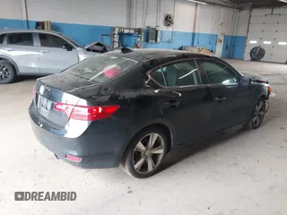 2014 Acura ILX Technology z VIN 19VDE1F71EE005731, wystawiony jako IAAI lot #42279107 z przebiegiem 84 083 mil mil oraz . Historia ofert i sprzedaży dostępna na DreamBid. Obrazek 4.