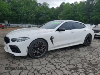 2022 BMW M8 Competition z VIN WBSGV0C07NCJ81642, wystawiony jako Copart lot #54758585 z przebiegiem 28 921 mil mil oraz Czysty tytuł • Clean title. Historia ofert i sprzedaży dostępna na DreamBid. Obrazek 1.