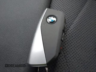 2023 BMW X1 xDrive28i with VIN WBX73EF05P5W59704, listed as a IAAI auction lot 41319741 with 11,637 mi miles. Bid and sale history available at carsss.com. Image 11.