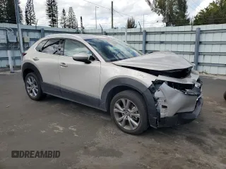 2024 Mazda CX-30 S Premium with VIN 3MVDMBDM6RM653469, listed as a Copart auction lot 47192475 with 9,854 mi miles and Salvage title. Bid and sale history available at DreamBid. Image 4.