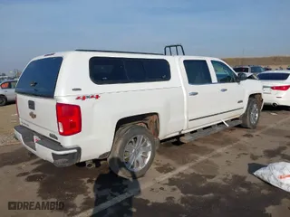 2017 Chevrolet Silverado 1500 High Country with VIN 3GCUKTEJ8HG172685, listed as a IAAI auction lot 41030890 with 113,688 mi miles. Bid and sale history available at carsss.com. Image 4.