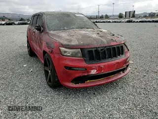 2012 Jeep Grand Cherokee SRT8 with VIN 1C4RJFDJ7CC217641, listed as a Copart auction lot 44060105 with 108,858 mi miles and Salvage Title. Bid and sale history available at carsss.com. Image 12.