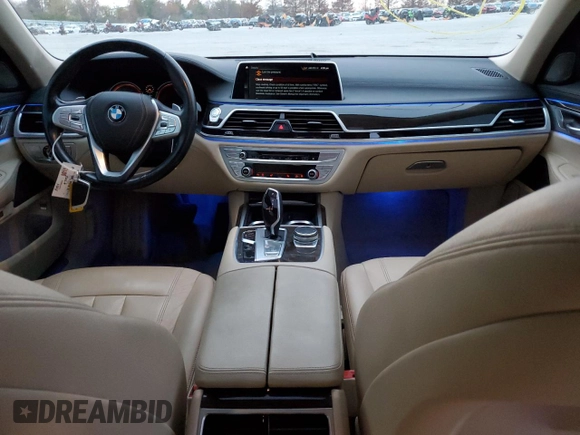2018 BMW 7 Series 740i xDrive with VIN WBA7E4C50JGV23975, listed as a Copart auction lot 82354264 with 63,657 mi miles and Salvage Title. Bid and sale history available at carsss.com. Image 8.