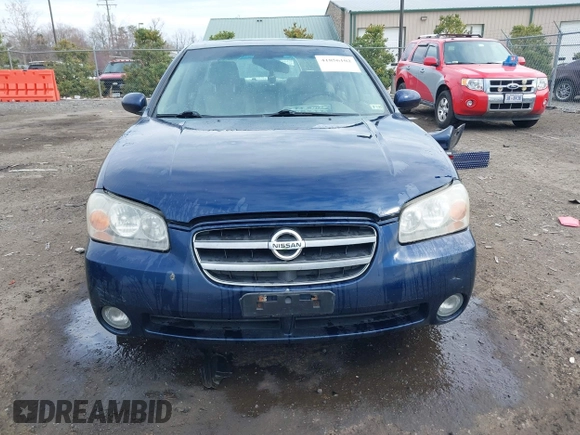 2003 Nissan Maxima GLE z VIN JN1DA31A03T412514, wystawiony jako IAAI lot #41856102 z przebiegiem 156 832 mil mil oraz . Historia ofert i sprzedaży dostępna na DreamBid. Obrazek 13.
