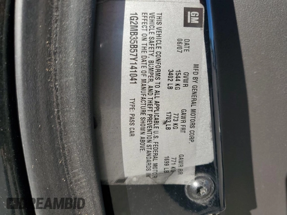 2007 Pontiac Solstice z VIN 1G2MB35B57Y141041, wystawiony jako Copart lot #70661994 z przebiegiem Nie podano mil oraz Czysty tytuł • Clean title. Historia ofert i sprzedaży dostępna na DreamBid. Obrazek 13.