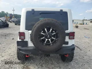 2017 Jeep Wrangler Unlimited Rubicon Recon with VIN 1C4BJWFG7HL696895, listed as a Copart auction lot 57409625 with 50,802 mi miles and Salvage title. Bid and sale history available at DreamBid. Image 6.