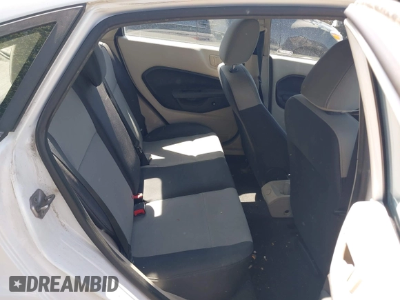 2013 Ford Fiesta S z VIN 3FADP4AJ6DM114105, wystawiony jako IAAI lot #42411838 z przebiegiem 497 236 mil mil oraz . Historia ofert i sprzedaży dostępna na DreamBid. Obrazek 8.