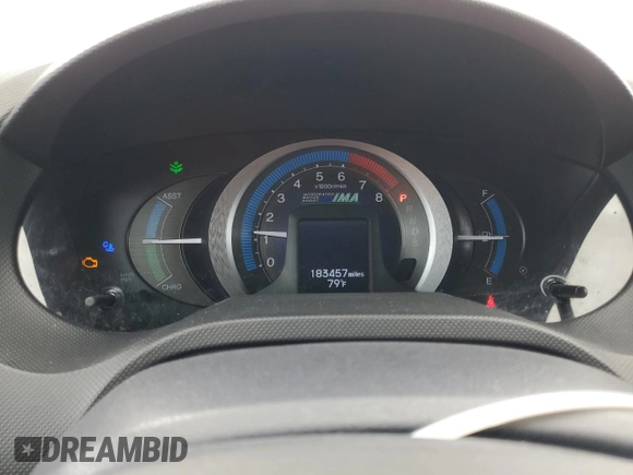 2010 Honda Insight EX with VIN JHMZE2H79AS038112, listed as a Copart auction lot 54794785 with 183,457 mi miles and Salvage Title. Bid and sale history available at DreamBid. Image 9.