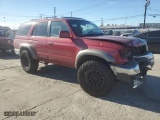 2000 Toyota 4Runner SR5 with VIN JT3HN86R7Y0311434, listed as a Copart auction lot 45641955 with 265,958 mi miles and Salvage Title. Bid and sale history available at carsss.com. Image 4.