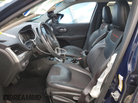 2015 Jeep Cherokee Trailhawk with VIN 1C4PJMBB8FW740452, listed as a Copart auction lot 63023715 with 96,236 mi miles and Salvage title. Bid and sale history available at DreamBid. Image 7.