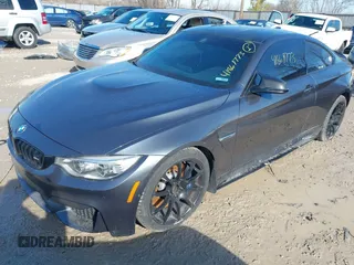 2015 BMW M4 z VIN WBS3R9C57FK334921, wystawiony jako IAAI lot #41869773 z przebiegiem 107 058 mil mil oraz . Historia ofert i sprzedaży dostępna na DreamBid. Obrazek 2.