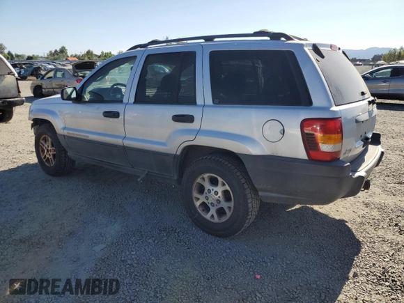 2004 Jeep Grand Cherokee Laredo with VIN 1J4GW48S54C103651, listed as a Copart auction lot 62972615 with 188,000 mi miles and Clean title. Bid and sale history available at DreamBid. Image 2.