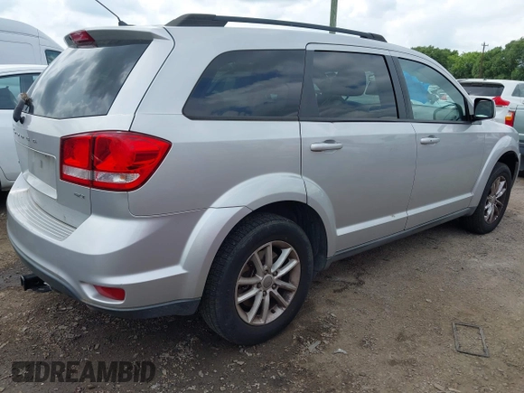 2013 Dodge Journey SXT with VIN 3C4PDDBG4DT571469, listed as a IAAI auction lot 42104433 with 166,068 mi miles and . Bid and sale history available at DreamBid. Image 4.