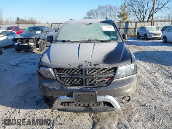 2016 Dodge Journey Crossroad Plus z VIN 3C4PDCGB0GT165975, wystawiony jako IAAI lot #41368904 z przebiegiem 101 835 mil mil oraz . Historia ofert i sprzedaży dostępna na DreamBid. Obrazek 12.