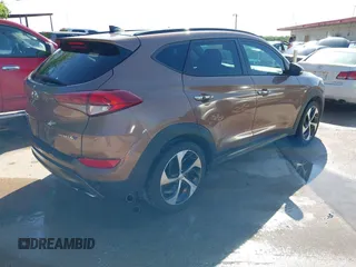 2016 Hyundai Tucson Limited with VIN KM8J33A25GU074798, listed as a IAAI auction lot 42103566 with 143,777 mi miles and . Bid and sale history available at carsss.com. Image 4.