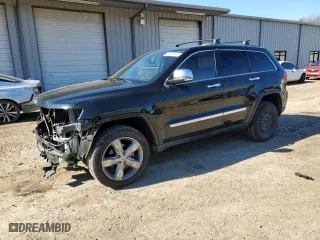 2012 Jeep Grand Cherokee Overland with VIN 1C4RJFCG0CC232021, listed as a Copart auction lot 89358695 with 129,196 mi miles and Salvage Title. Bid and sale history available at carsss.com. Image 1.