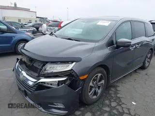 2018 Honda Odyssey Touring with VIN 5FNRL6H88JB062213, listed as a IAAI auction lot 42489379 with 90,578 mi miles and . Bid and sale history available at DreamBid. Image 18.