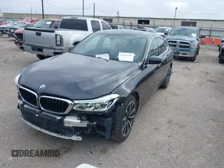 2019 BMW 6 Series 640i xDrive with VIN WBAJV6C50KBK08934, listed as a IAAI auction lot 41588796 with 61,411 mi miles and . Bid and sale history available at carsss.com. Image 2.