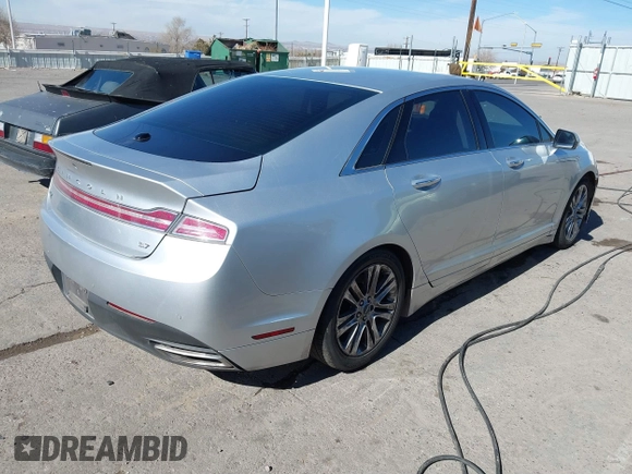 2014 Lincoln MKZ with VIN 3LN6L2GK2ER817686, listed as a IAAI auction lot 41505907 with 318,636 mi miles. Bid and sale history available at carsss.com. Image 4.