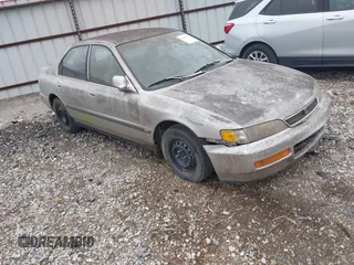 1996 Honda Accord LX with VIN 1HGCD563XTA289338, listed as a IAAI auction lot 41896052 with 221,401 mi miles and . Bid and sale history available at carsss.com. Image 1.