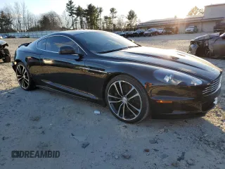 2012 Aston Martin DBS z VIN SCFFBCBD0CGE03238, wystawiony jako Copart lot #87450334 z przebiegiem 89 666 mil mil oraz Tytuł czysty. Historia ofert i sprzedaży dostępna na DreamBid. Obrazek 4.