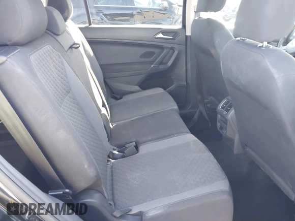 2018 Volkswagen Tiguan S with VIN 3VV1B7AX1JM091928, listed as a IAAI auction lot 42283454 with 53,650 mi miles and . Bid and sale history available at DreamBid. Image 8.