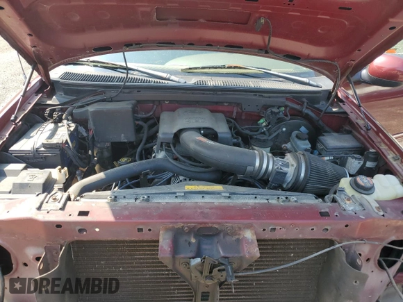 1998 Ford F-150 with VIN 1FTZX18W8WNB76999, listed as a Copart auction lot 59845595 with 135,063 mi miles and Salvage title. Bid and sale history available at DreamBid. Image 12.