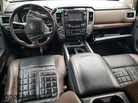 2017 Nissan Titan XD SL with VIN 1N6AA1F41HN548361, listed as a Copart auction lot 84654174 with 142,057 mi miles and Salvage Title. Bid and sale history available at carsss.com. Image 8.