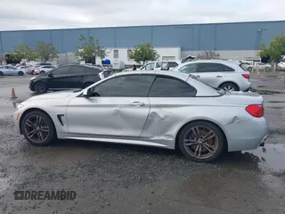 2015 BMW 4 Series 428i with VIN WBA3V7C50FP772915, listed as a IAAI auction lot 41526014 with 116,800 mi miles. Bid and sale history available at carsss.com. Image 14.