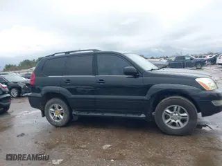 2005 Lexus GX 470 with VIN JTJBT20X150084634, listed as a IAAI auction lot 41461071 with 180,387 mi miles. Bid and sale history available at carsss.com. Image 13.