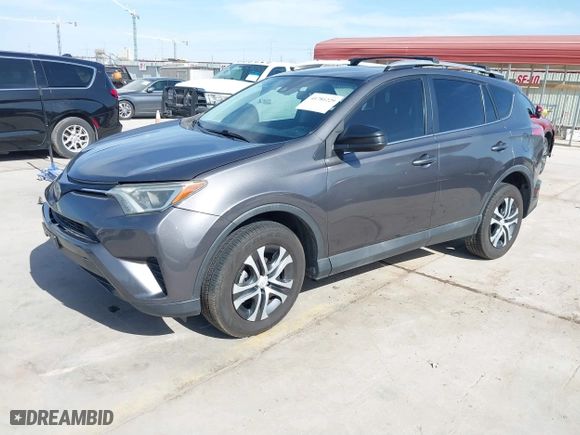 2018 Toyota RAV4 LE with VIN 2T3ZFREV4JW412661, listed as a IAAI auction lot 41781229 with 140,131 mi miles. Bid and sale history available at carsss.com. Image 18.
