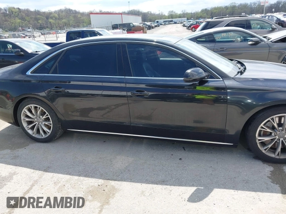 2012 Audi A8 L with VIN WAURVAFD5CN038949, listed as a IAAI auction lot 41914575 with 85,634 mi miles. Bid and sale history available at carsss.com. Image 13.