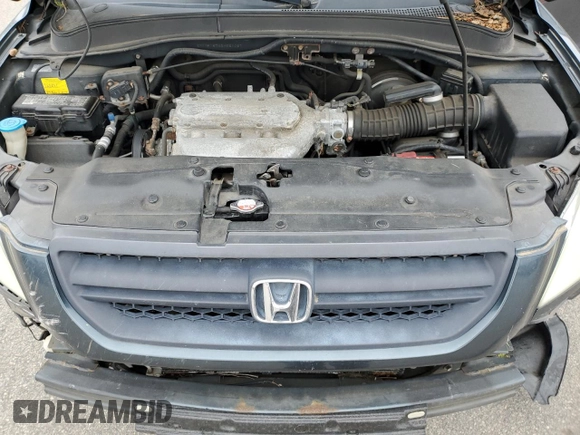 2005 Honda Pilot EX-L z VIN 2HKYF18735H551087, wystawiony jako Copart lot #53953665 z przebiegiem Nie podano mil oraz Szkoda całkowita • Salvage title. Historia ofert i sprzedaży dostępna na DreamBid. Obrazek 12.