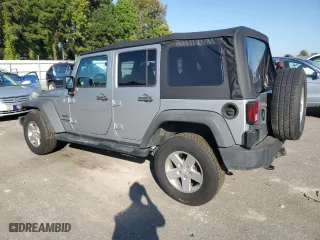 2014 Jeep Wrangler Unlimited Sport with VIN 1C4BJWDG8EL134356, listed as a Copart auction lot 74378874 with 103,318 mi miles and Salvage Title. Bid and sale history available at carsss.com. Image 2.